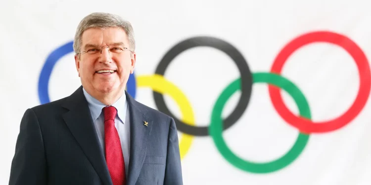 A photo of Thomas Bach, the current president of the International Olympic Committee, with the Olympic rings. (Photography: ASSOCIATION OF NATIONAL OLYMPIC COMMITTEES OF AFRICA)
