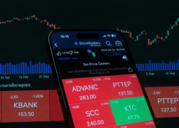A financial market data board, symbolising the market pricing of value and reputation in real time. (Photography: Pexel)