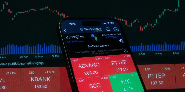 A financial market data board, symbolising the market pricing of value and reputation in real time. (Photography: Pexel)